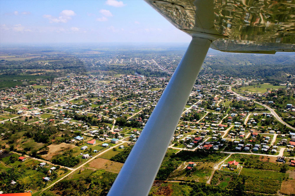 Aerial view of beautiful San Ignacio Town. Santa Elena is further in the background