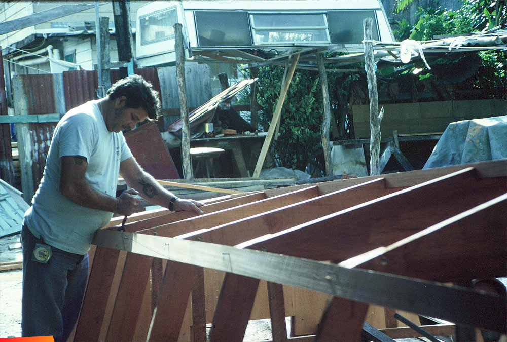 Gonzalo Munoz building a Mahogany skiff, 1992