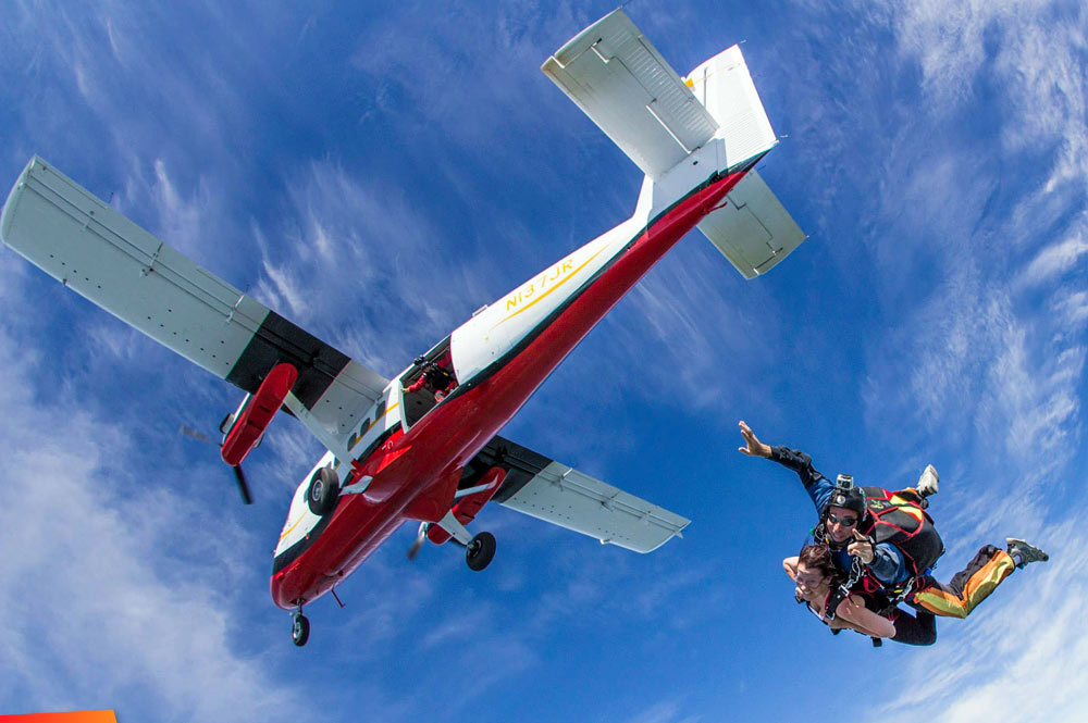 Skydiving over Belize, right after jump, looking back up