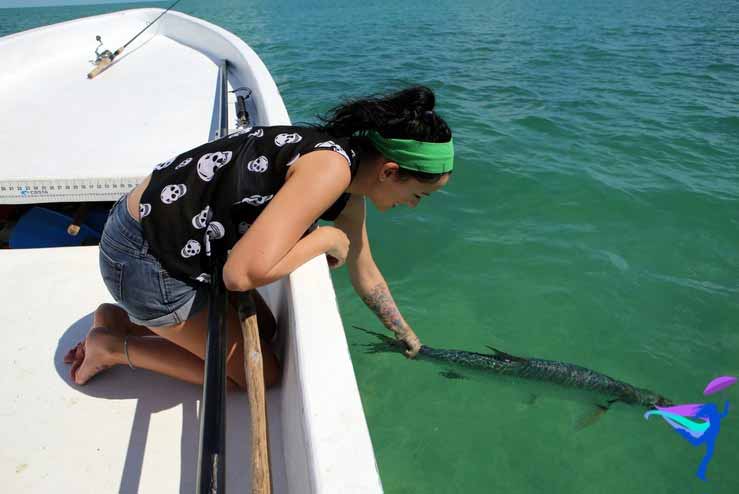 GoFish Belize girl caught huge tarpon fish