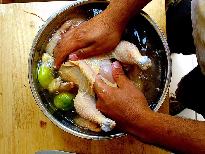 Washing the Chicken with Water and Lime
