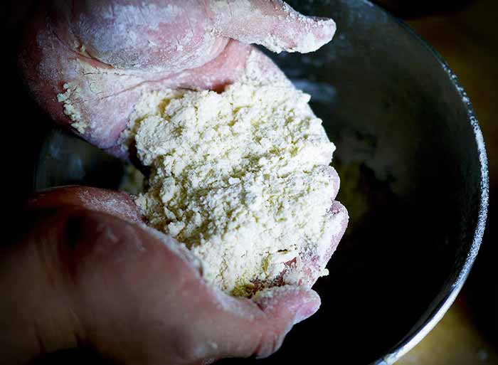 Butter mixed in by hand with flour