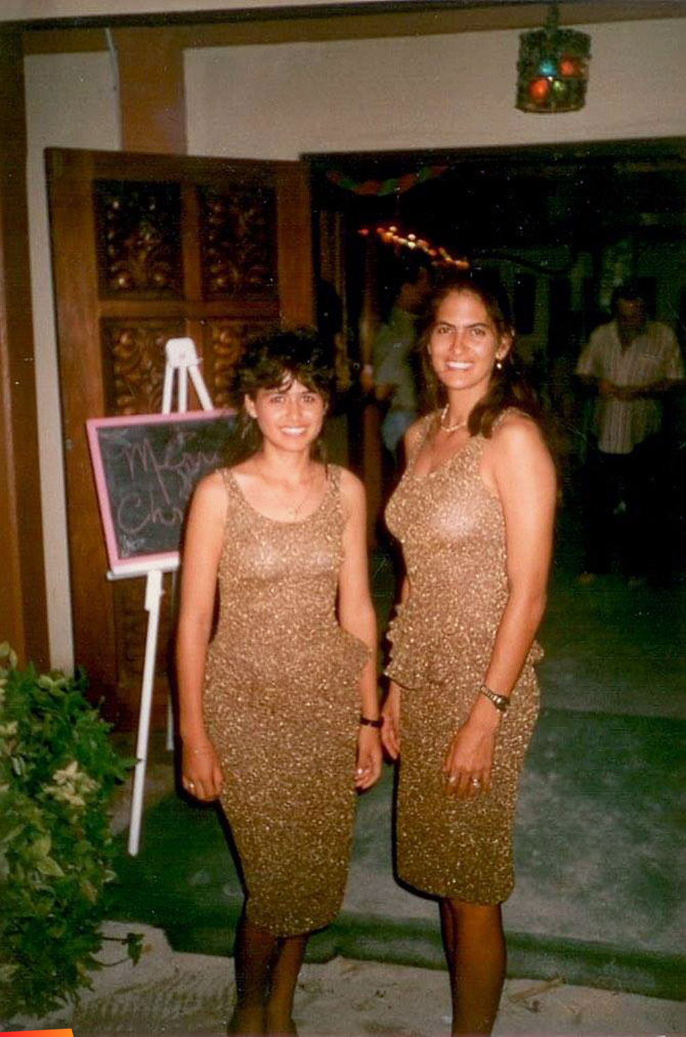Lisa McCorkle-Guerrero and Celi Jean McCorkle outside Holiday Hotel Christmas Party-1984