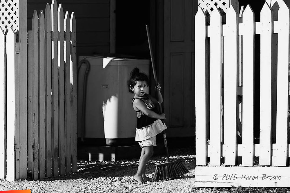 Sweeping Up Little girl with broom