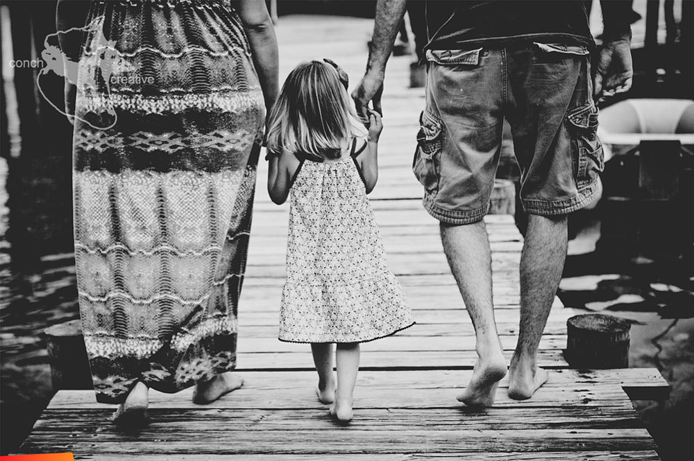Family walking on the dock