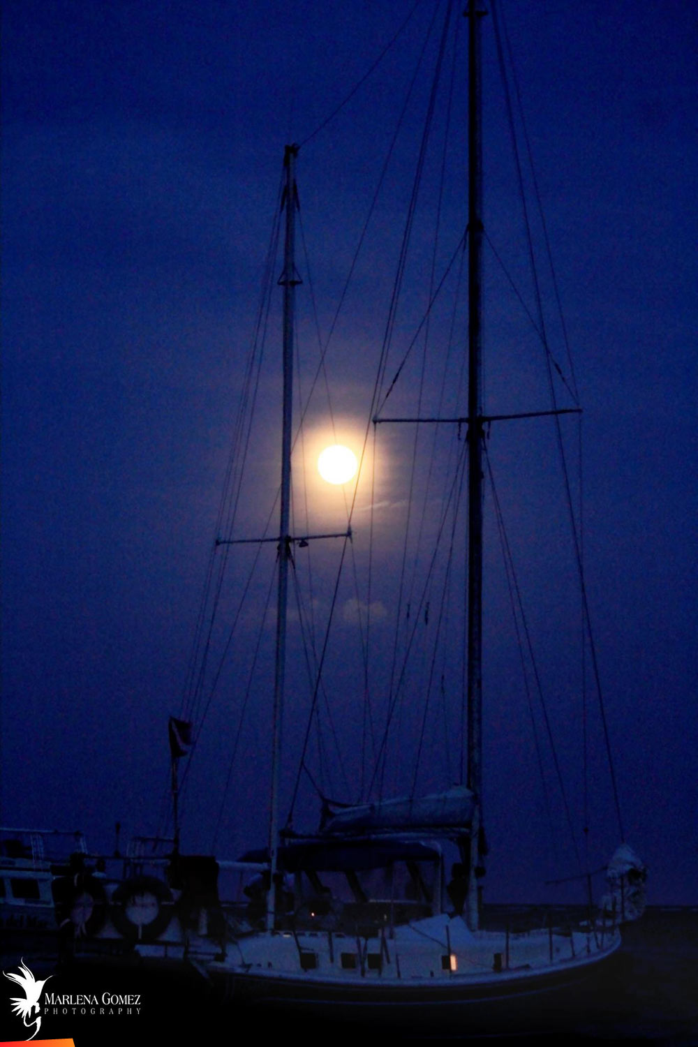 Sail Boat Silhouette by the Super Moon