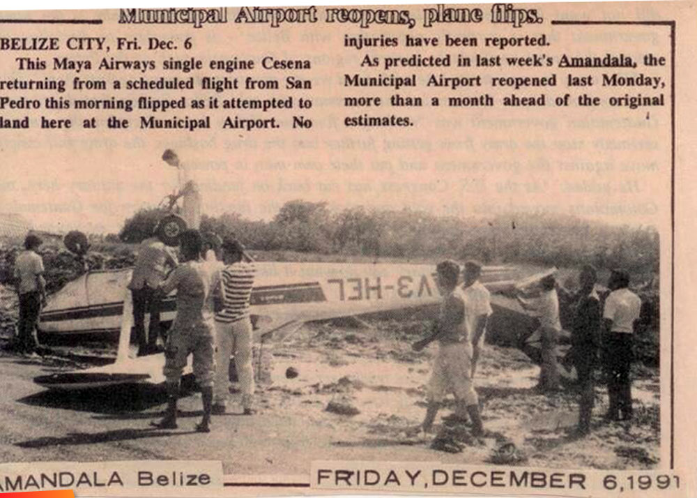 Plane flips on landing at Municipal Airport, December, 1991. Article in Amandala