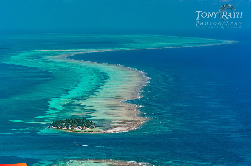 Tobacco Caye entrance, Tobacco Caye and curve of the Belize Barrier Reef north towards Belize City