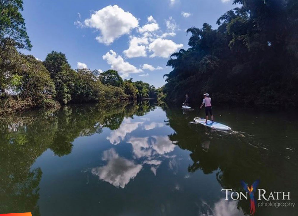 Paddle boarding down the Sittee River