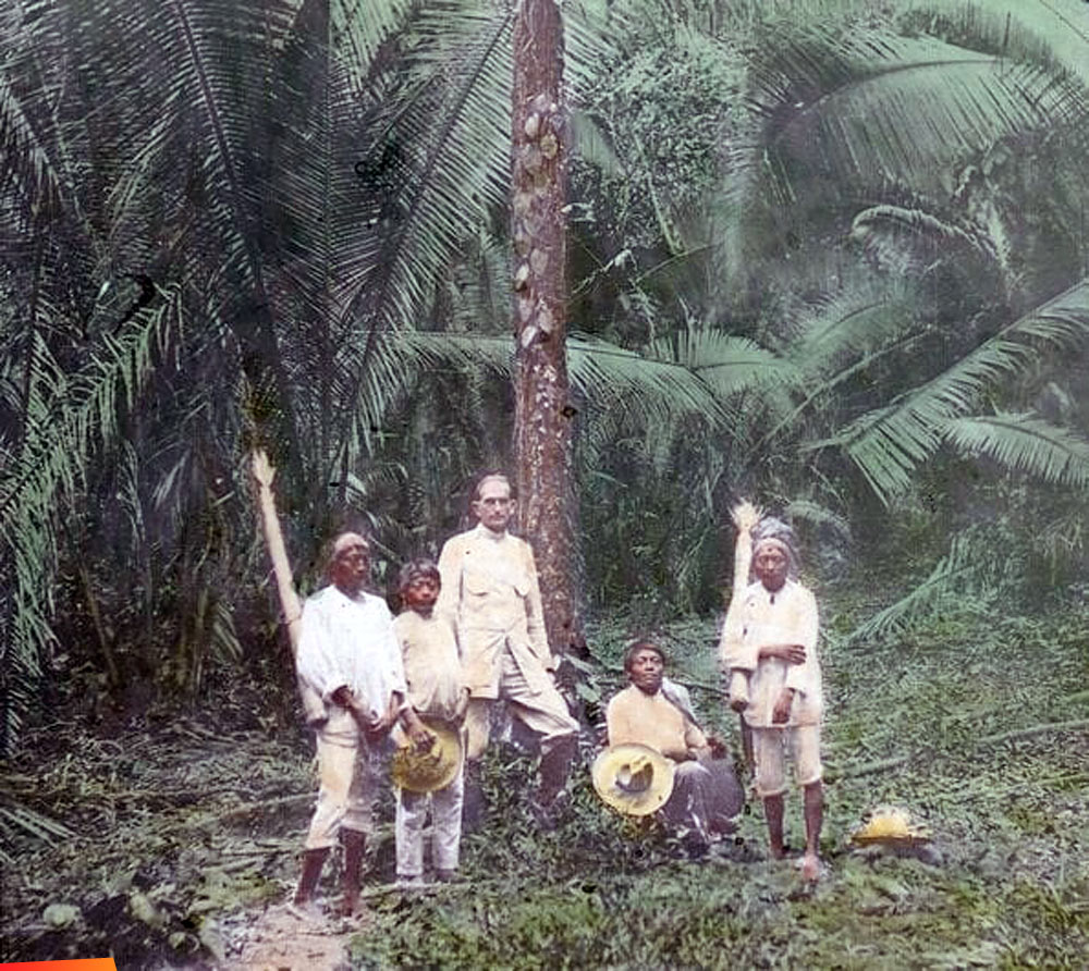 Jesuit priest, Fr. Fusz with Maya guides taking a break along the gruelling trek from Punta Gorda to San Antonio through forest trails, early 1900's