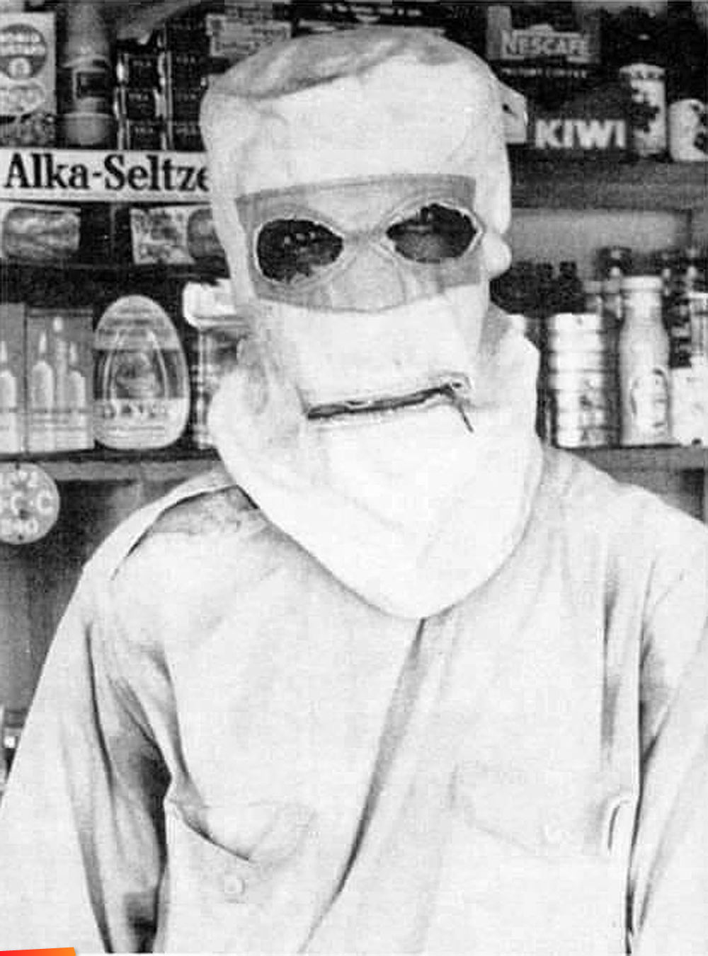 Mask Man in his shop in Belize City, 1960's