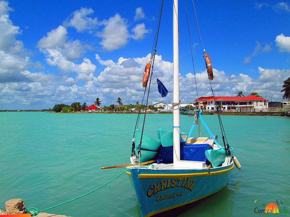 The beautiful colors of Corozal Bay, Christina in the foreground