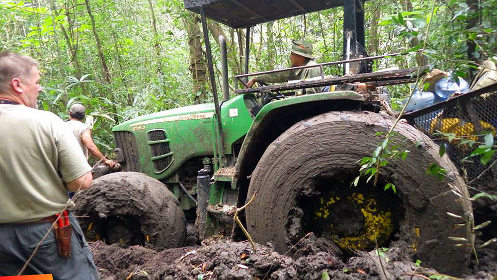 Tractor stuck in deep mud in the Chiquibul