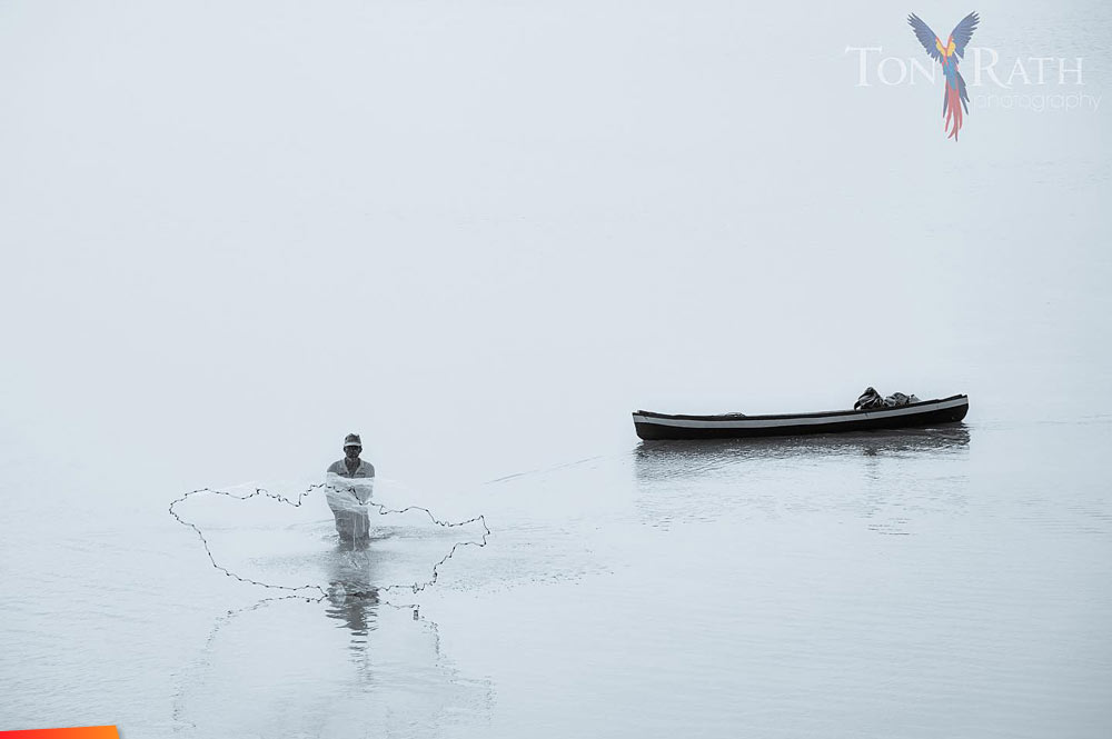 Dangriga fisherman with cast net