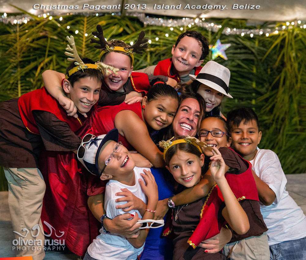 Big hug with lots of children, Island Academy Christmas Pageant 2013