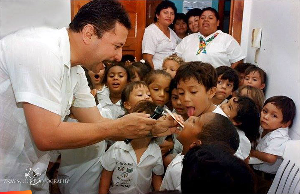 The Wonderful Doctor Otto Rodriguez with a group of children