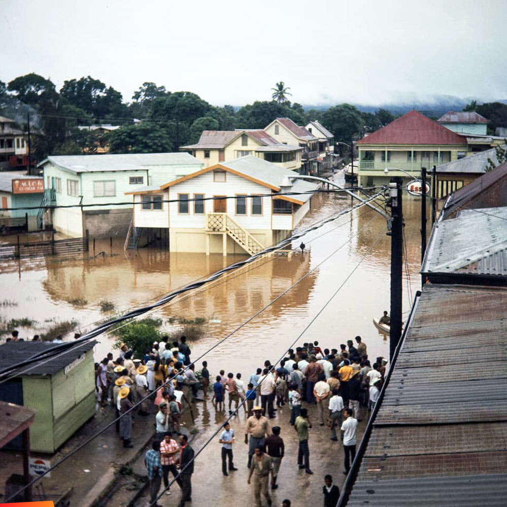 Views from around San Ignacio and the Hawkesworth Bridge during a flood, 1971