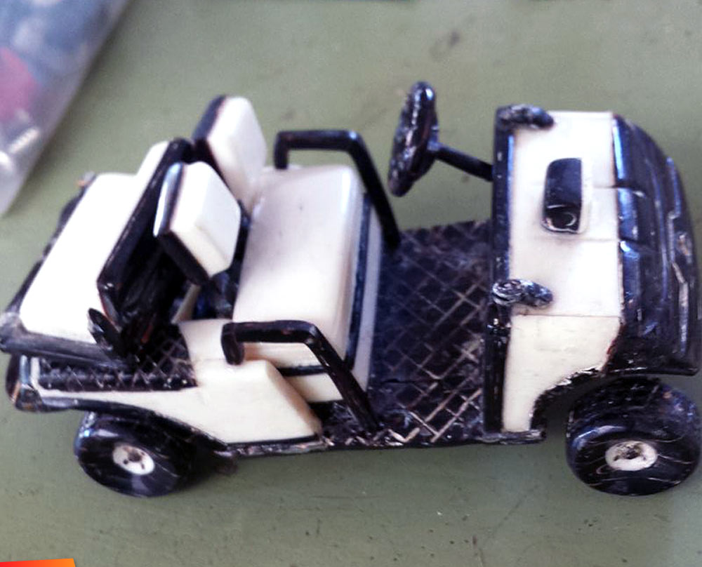 Little truck made from black coral, long ago