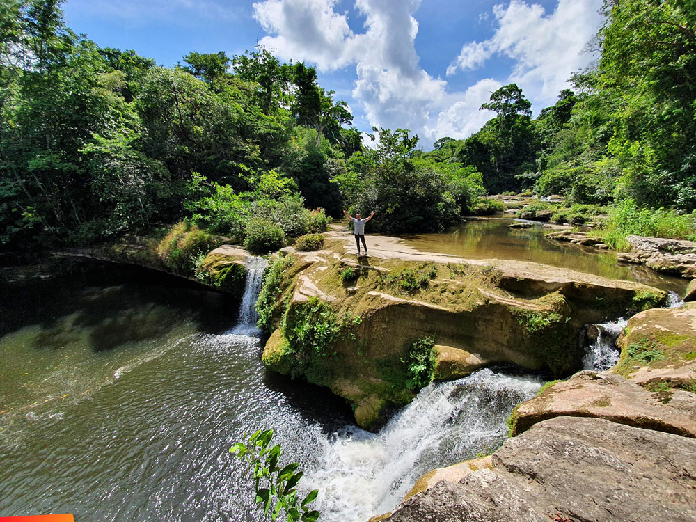 Views of Rio Blanco National Park, including waterfalls and the suspension bridge