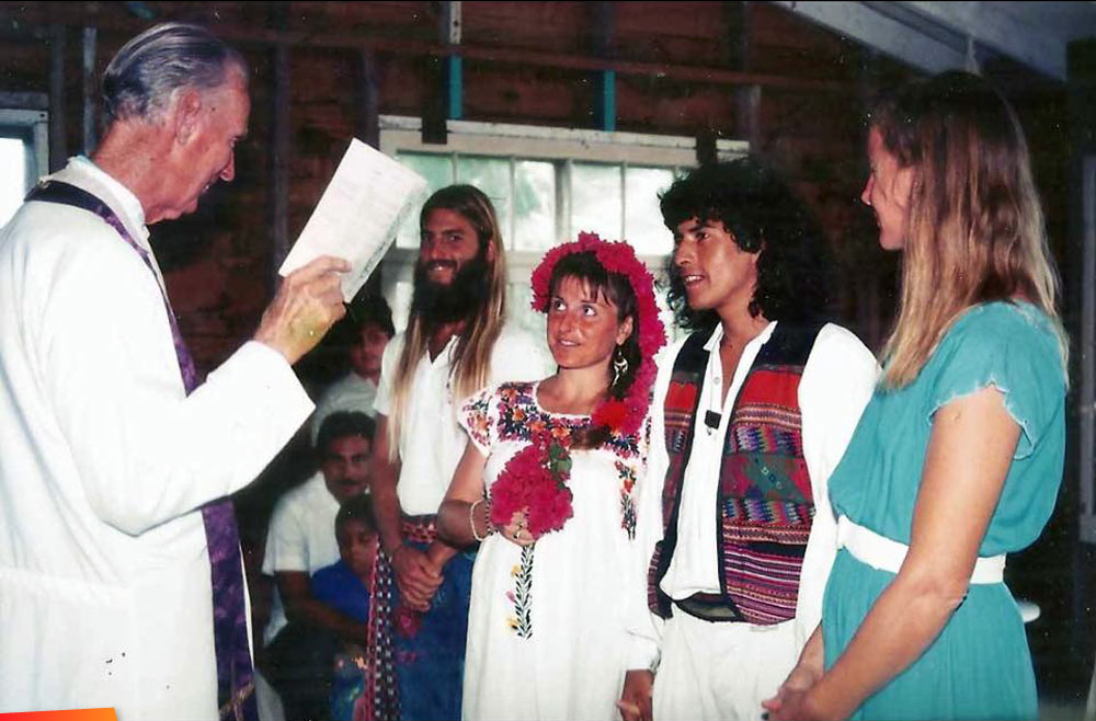 Elisabeth Ouvrard and Jorge Ayala getting married, Father Raskowski presiding, Maggie in the foreground, 1981