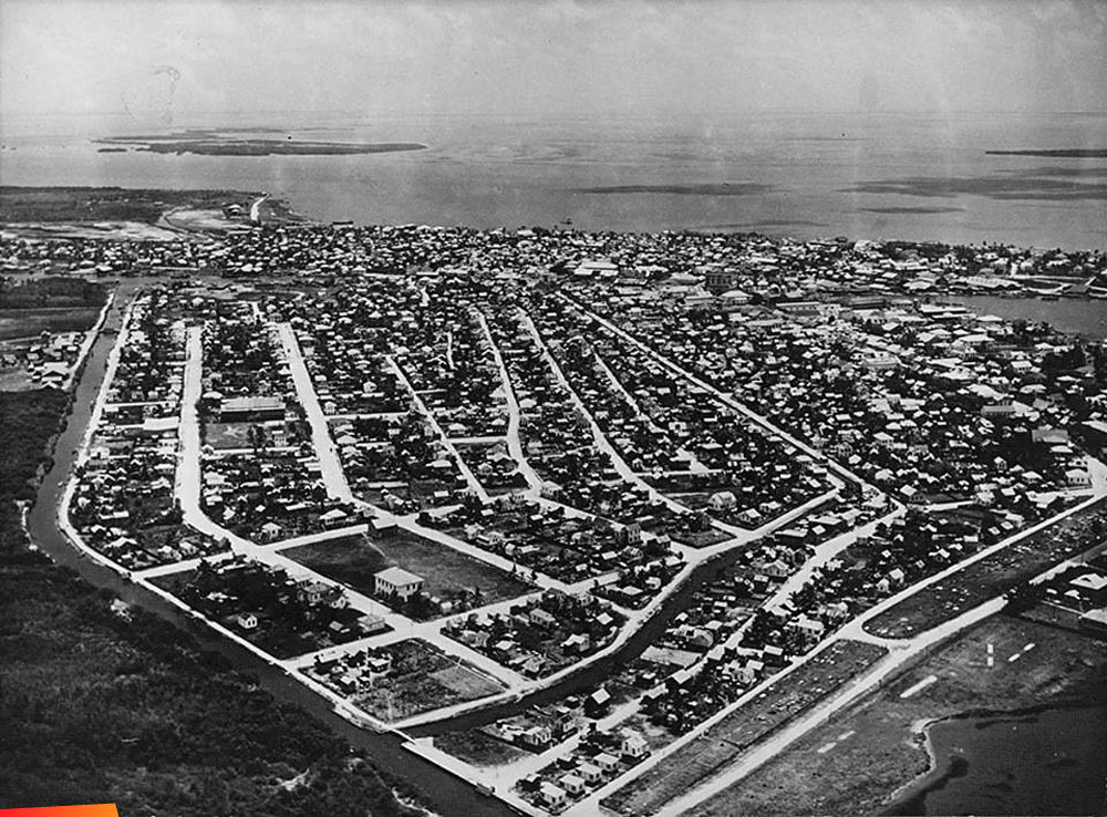 Aerial view of Belize City looking toward the sea, 1952