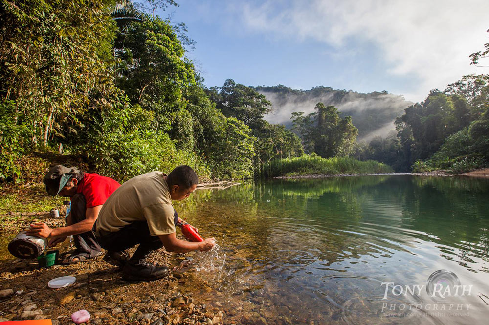 Morning chores at Quebrada De Oro camp in the Bladen Nature Reserve