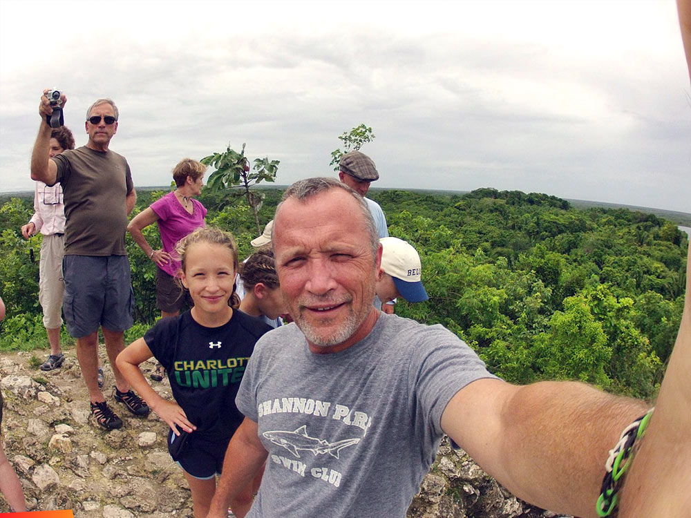 Family photo from the top of a Maya temple