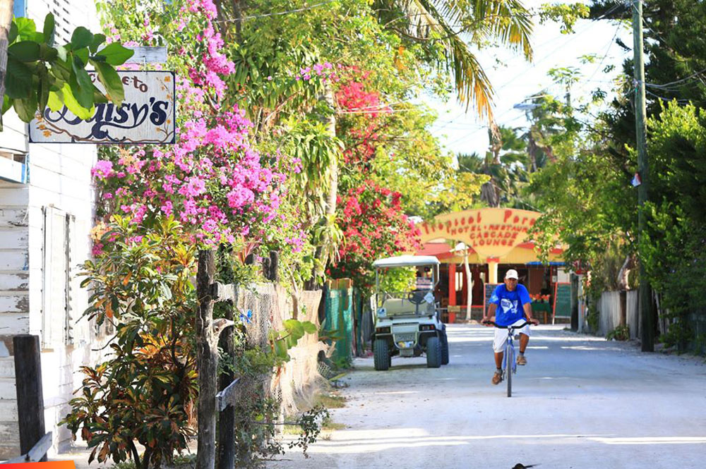 Bicycling down the street on Caye Caulker