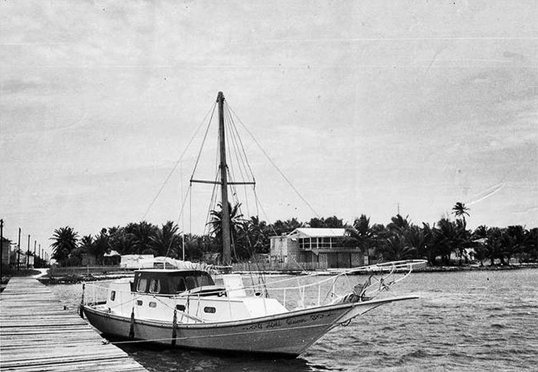 >A 1960's photo of my father's (Ray Auxillou) Hideaway Reef Lodge on Caye Caulker (1st hotel on CC) and his boat, the Atoll Queen, also an ad for the lodge from Field & Stream 1973