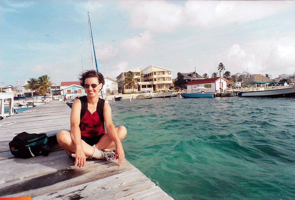 Becky Casado on Tackle Box Pier, 2001. Spindrift Hotel and Tackle Box in background along with part of the San Pedro beachfront