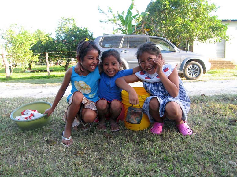 Girls selling tamales, Succotz, Belize