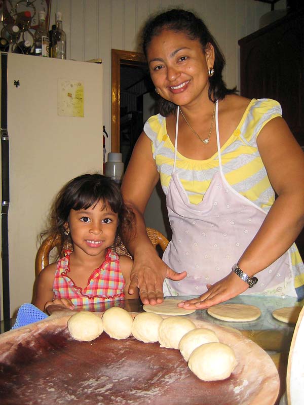 Elodia and Genesis Nunez making tortillas