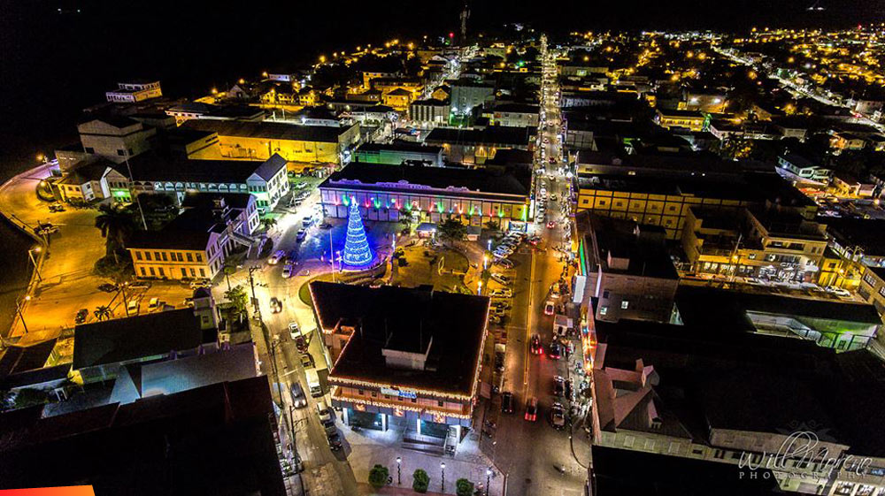 Aerial view of downtown Belize City at night during the Christmas season, 2018