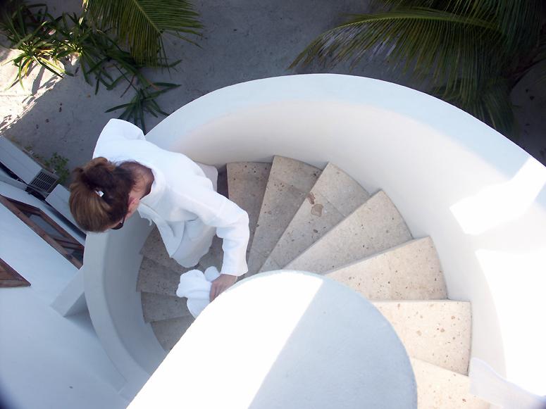 Circular stairway going down from the roof at Azul Belize