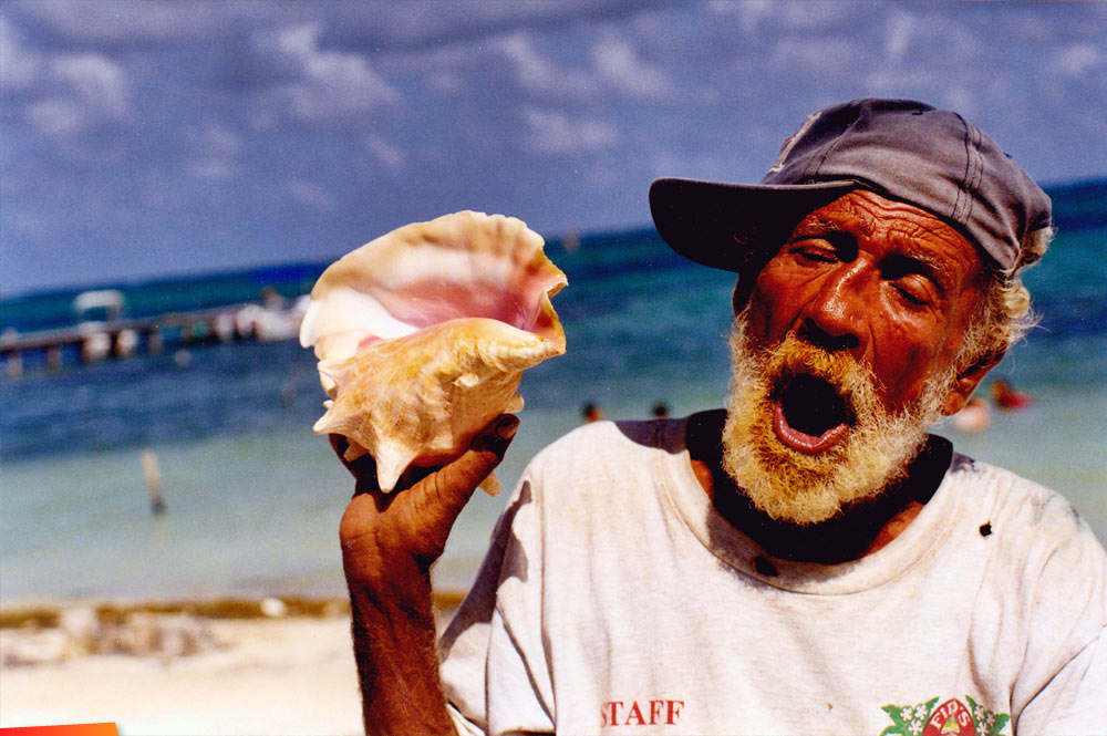 Paisano modeling with his conch shell, 1998