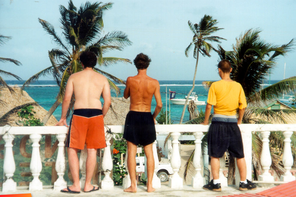 Jacob McNeill, Marty Casado, and Ryan Casado looking to the sea from the top of the Sands Hotel in San Pedro, 2003