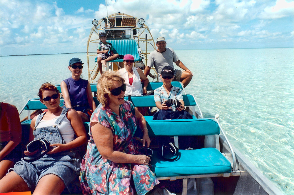 Playing on Kevin and Iraida Gonzalez' airboat, 1999