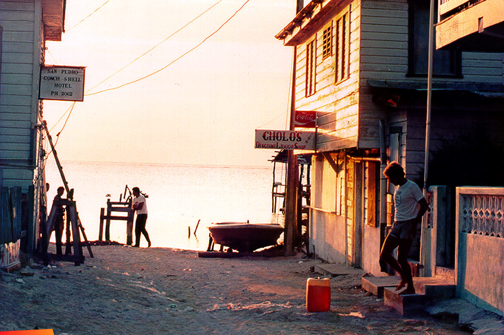 Fishermen headed out at sunrise, looking out to sea. Between Cholo's and Conch Shell Hotel, early 1982