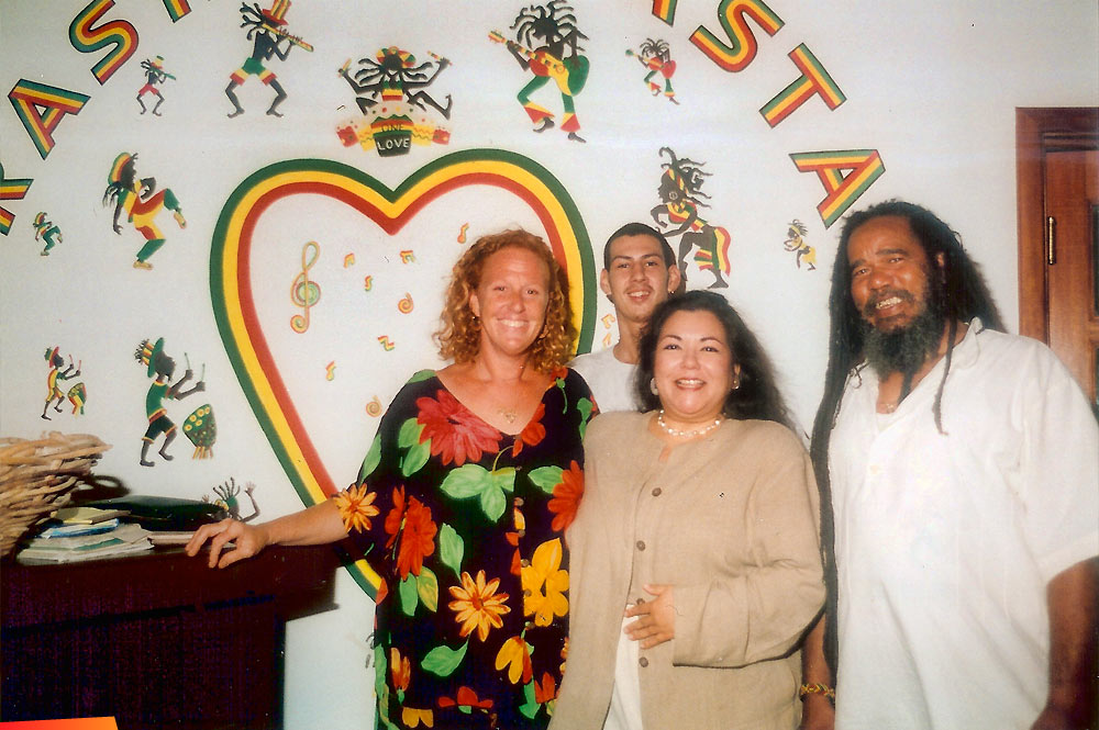 Maralyn Gill, Albert Gill, Shanti, and Her Excellency American Ambassador Carolyn Curiel during dinner at Rasta Pasta, 1998